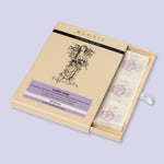 Kloris sleep time botanical patches in a cardboard box on a light purple background